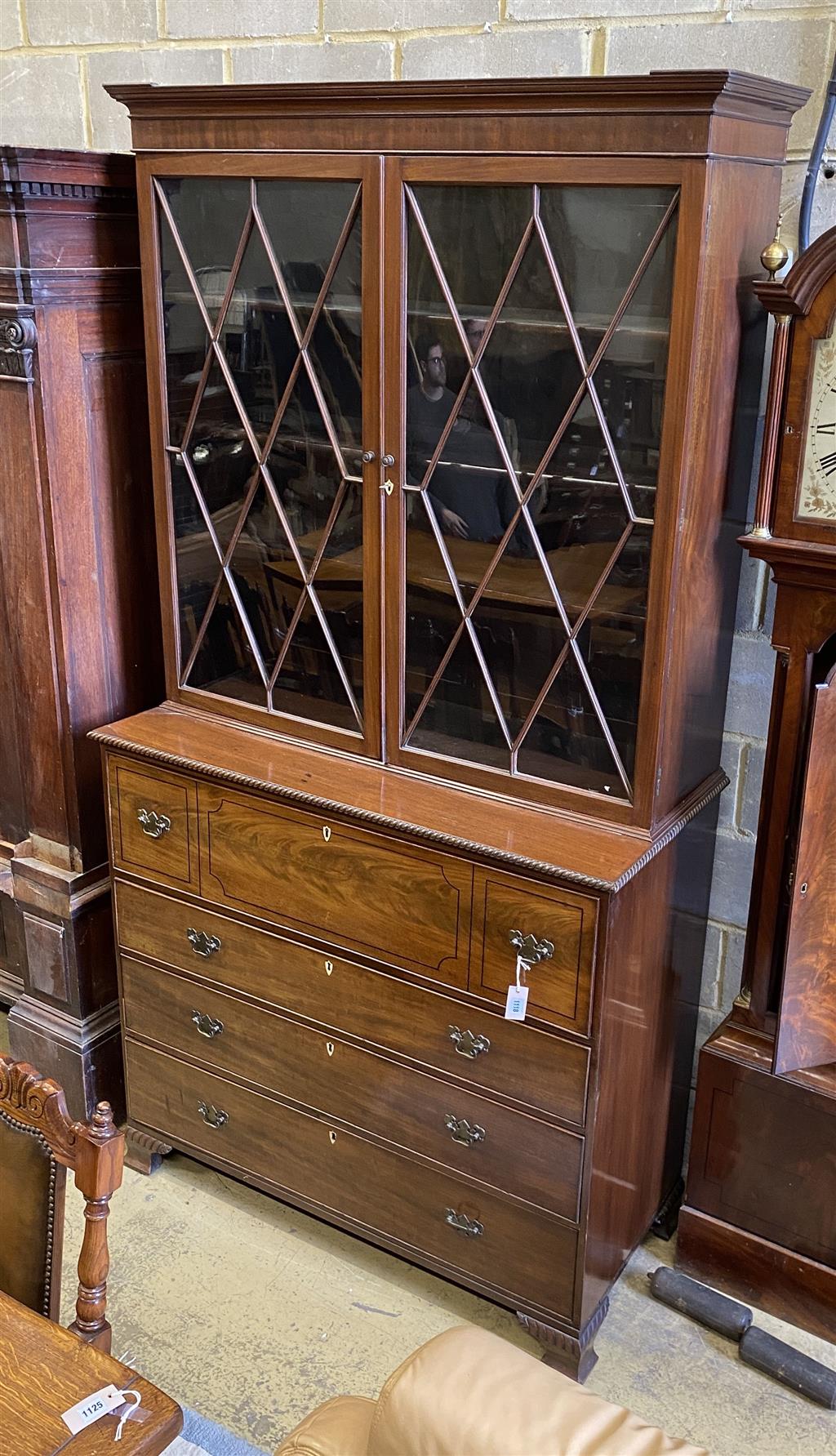 A George III mahogany secretaire bookcase, length 124cm, depth 58cm, height 236cm,